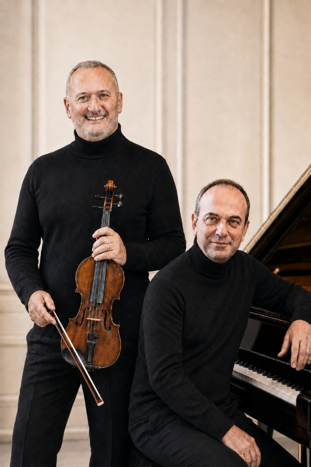 Paolo Castellani e Michele Rossetti accanto al pianoforte